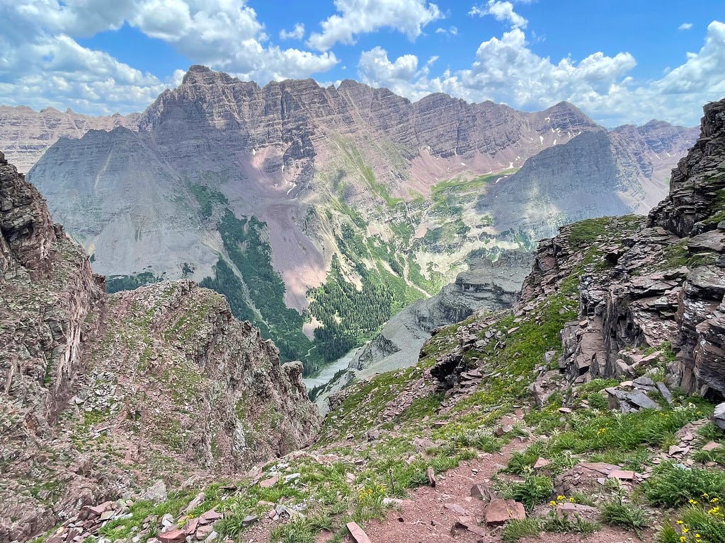 Continuing to descend North Maroon’s maze of gullies.