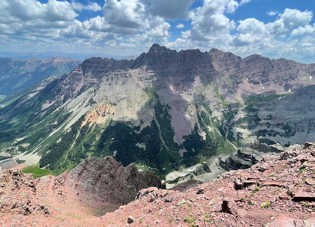 Near the top of the first gully descending North Maroon with Pyramid Peak in view.